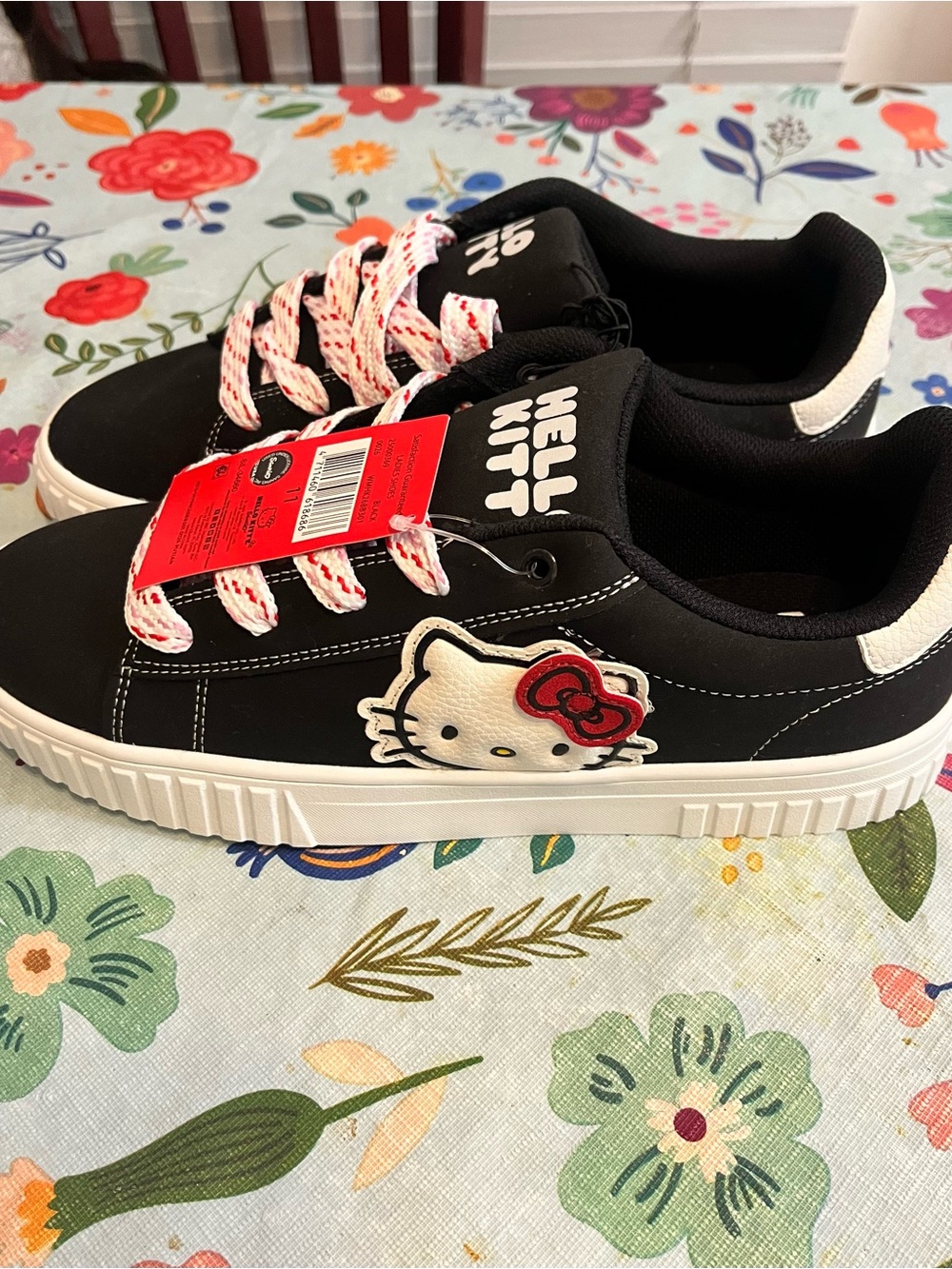 Hello Kitty Black Sneakers with White Sole and Red Bow Accent